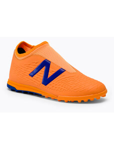 Buty piłkarskie dziecięce New Balance Tekela V3+ Magique JNR TF impulse/vibrant orange