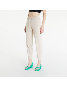 Damskie spodnie dresowe Nike NSW Jersey Easy Joggers Sanddrift/ White