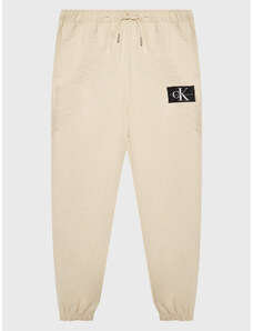 Calvin Klein Jeans Spodnie dresowe IB0IB01505 Beżowy Regular Fit