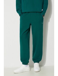 Puma spodnie dresowe bawełniane MMQ Sweatpants kolor zielony gładkie 624007