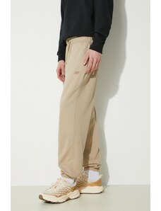 New Balance spodnie dresowe bawełniane MP41508SOT kolor beżowy gładkie