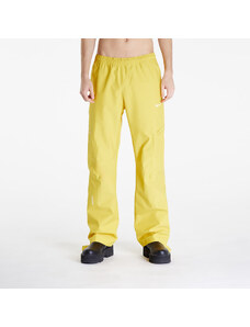 Męskie spodnie nylonowe Nike x NOCTA x L'ART DE L’AUTOMOBILE Men's Tech Pants Vivid Sulfur/ Sail