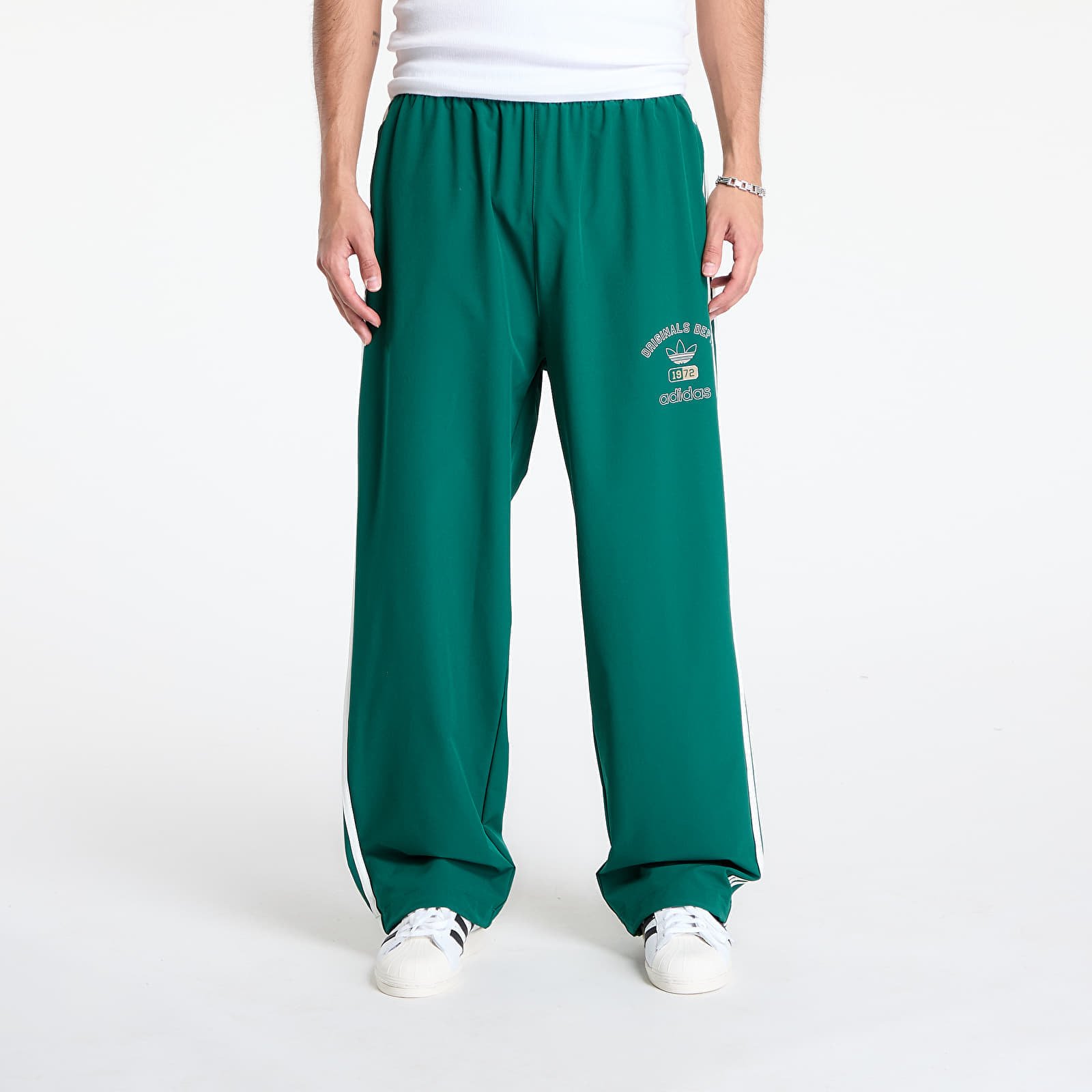 Spodnie adidas Originals Dept. Woven Firebird Track Pant Collegiate Green S