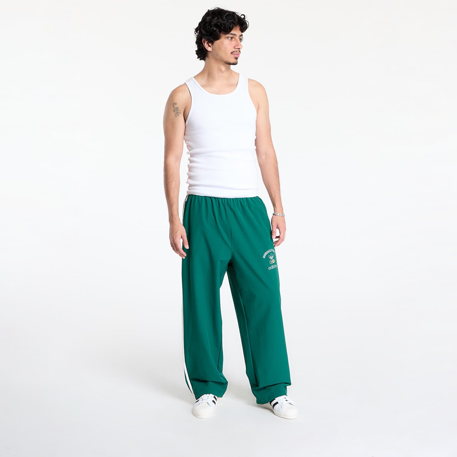 Spodnie adidas Originals Dept. Woven Firebird Track Pant Collegiate Green S