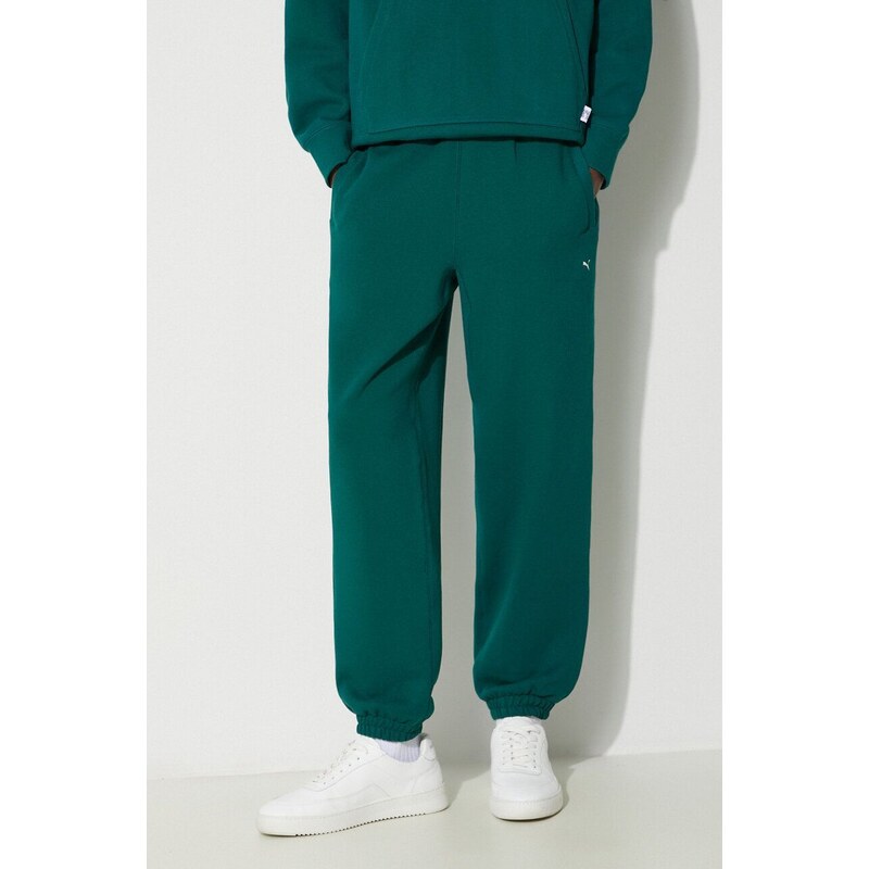Puma spodnie dresowe bawełniane MMQ Sweatpants kolor zielony gładkie 624007